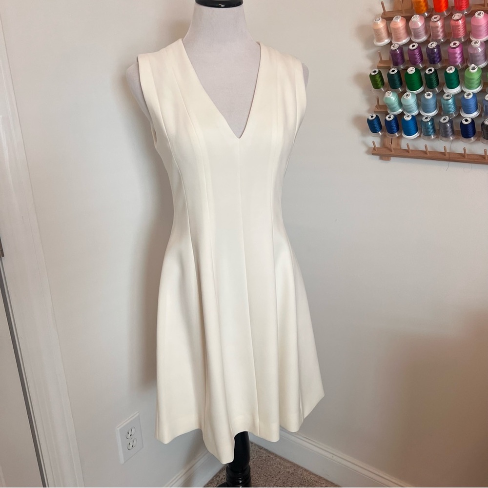 Josie Natori Sleeveless White Vneck Semi Pleated Dress